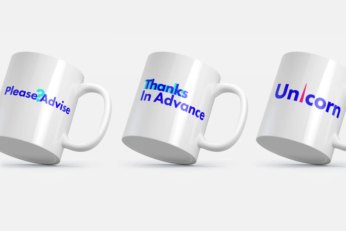 Three white coffee mugs printed with Please Advise, Thanks In Advance, and Unicorn